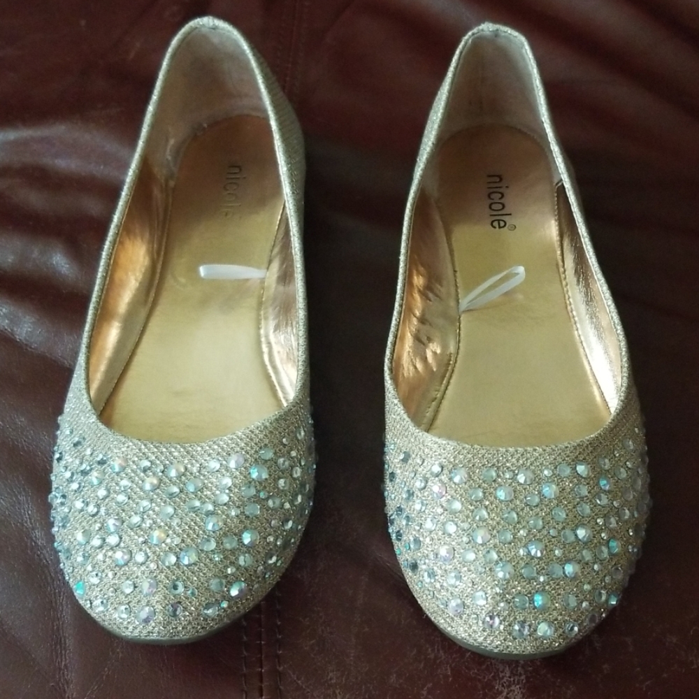 Nicole  gold sparkle flats.